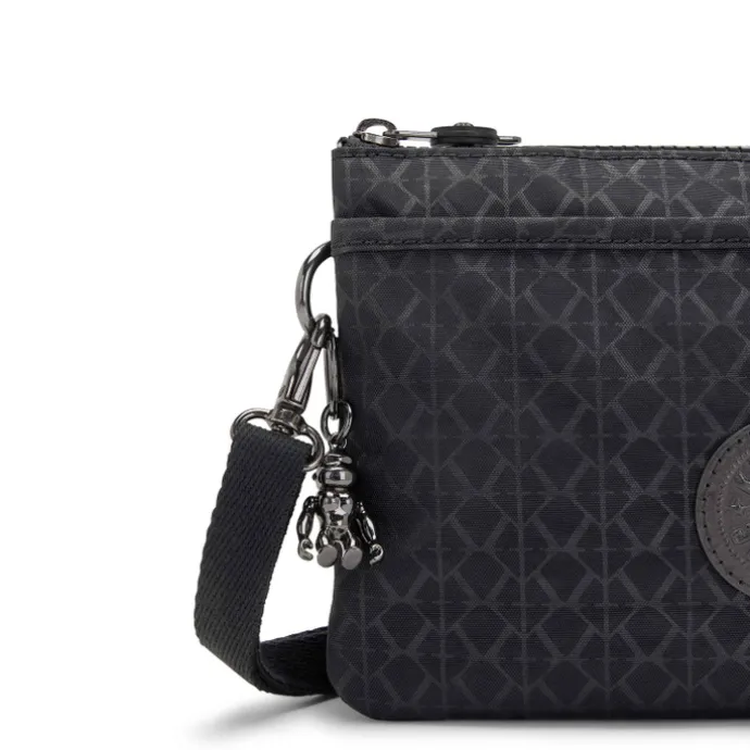 Kipling Riri signature emb